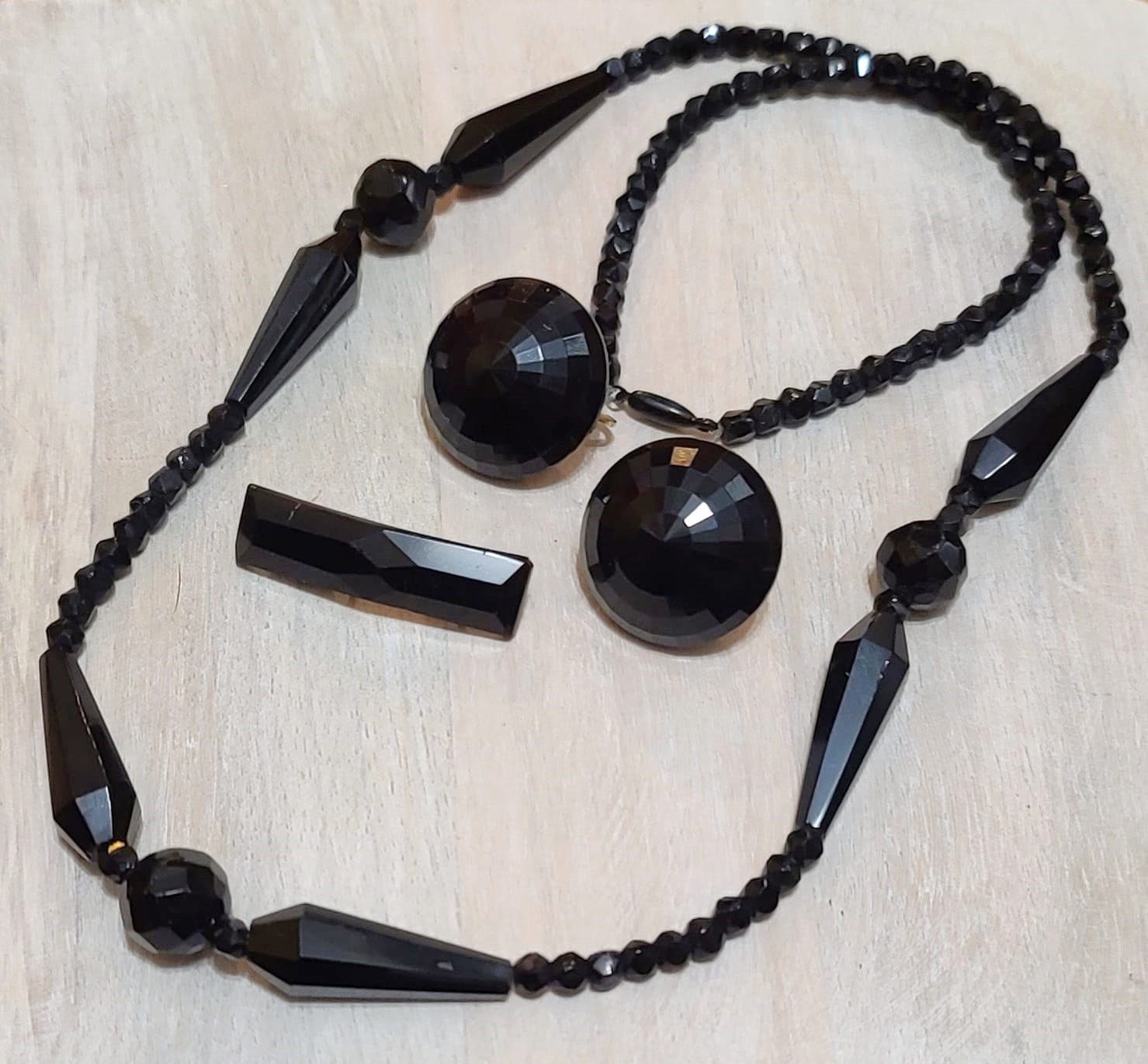 Faceted black glass necklace, earrings & pinand clipon earrings
