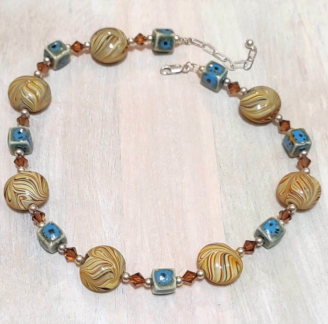 Swirl glass beads, ceramic and austrian crystals, handrafted, sterling silver chain and clasp