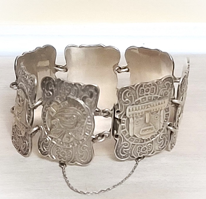 Aztec bracelet, sterling silver, heavy linked panels with aztec patterns, with a safety chain