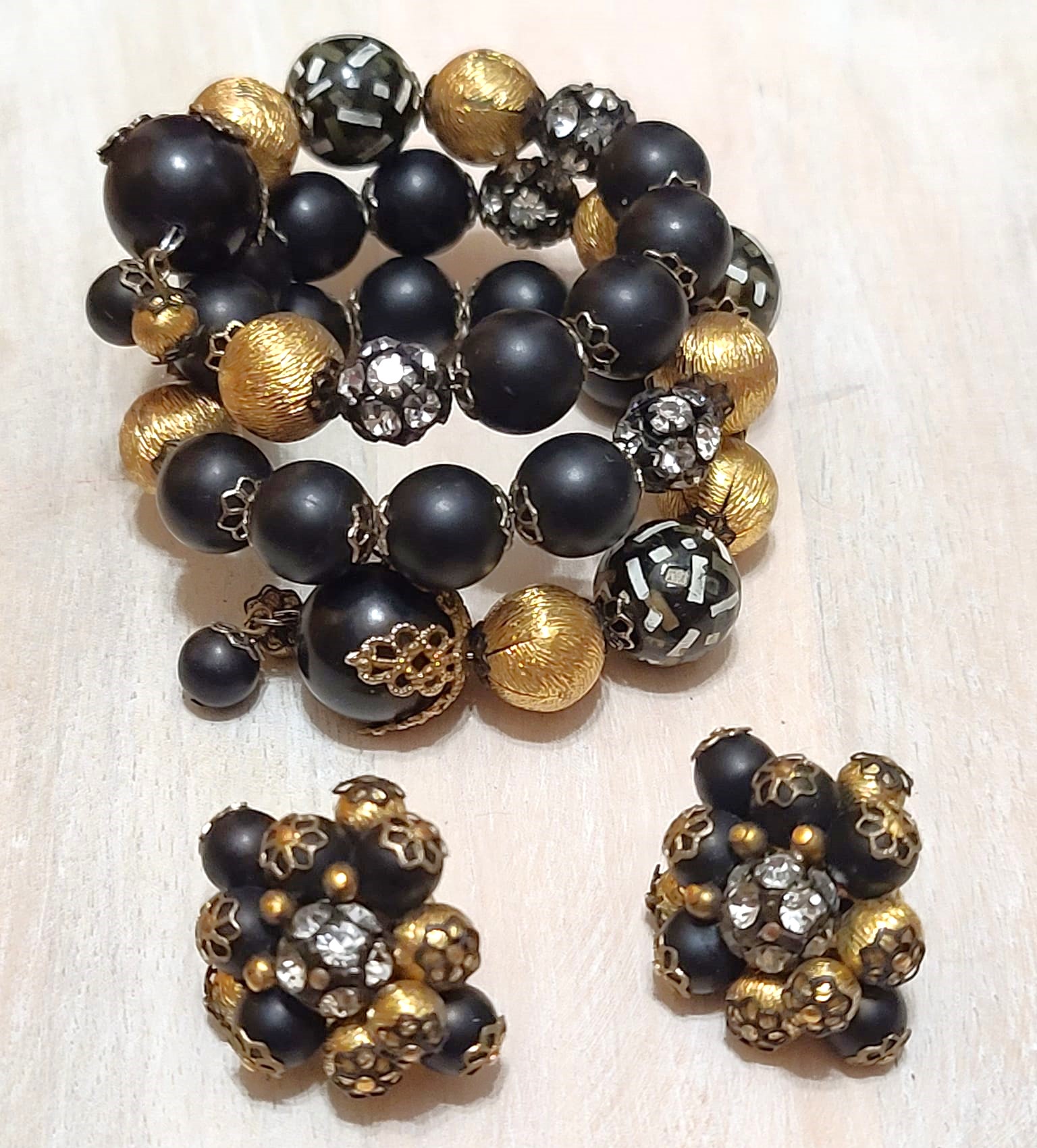 Designer Hobe rhinestone and bead memory wire bracelet and clip on earrings black,confetti,gold