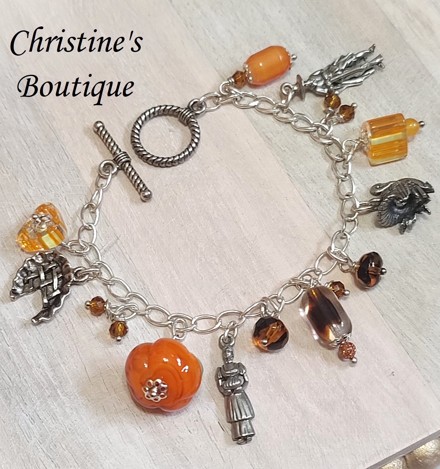 Thanksgiving charm bracelet, pewter turkey, apple pie, pilgrams and alternating glass beads - Click Image to Close