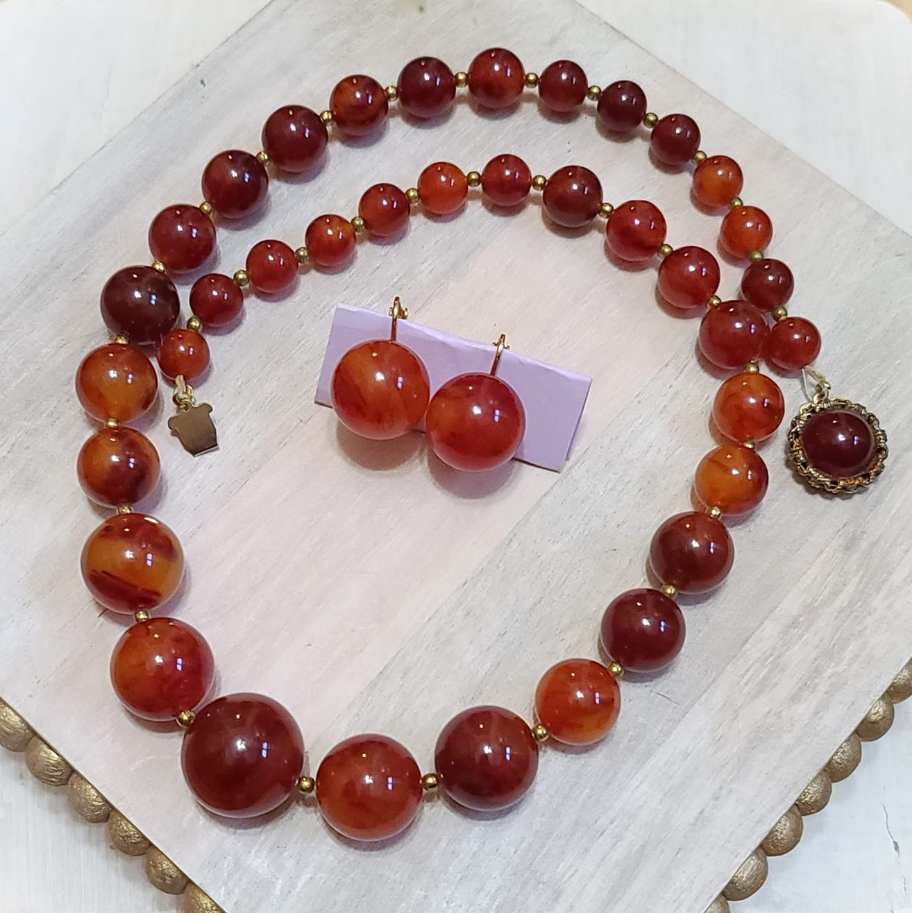 Richelle designer carnelian color beaded necklace and earrings