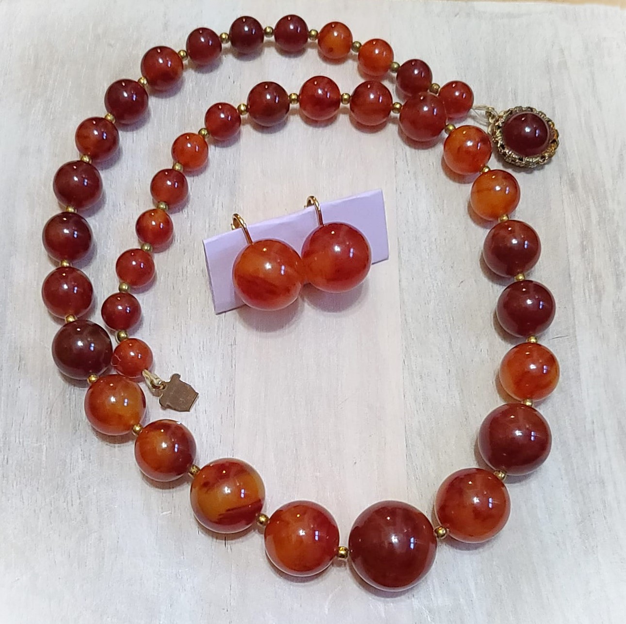 Richelle designer carnelian color beaded necklace and earrings