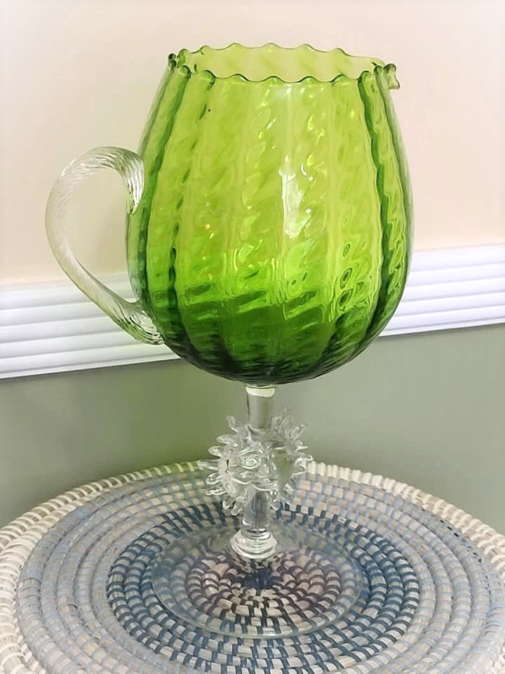 Vintage green glass vase, with sun motif, large pitcher 12 1/2 inches