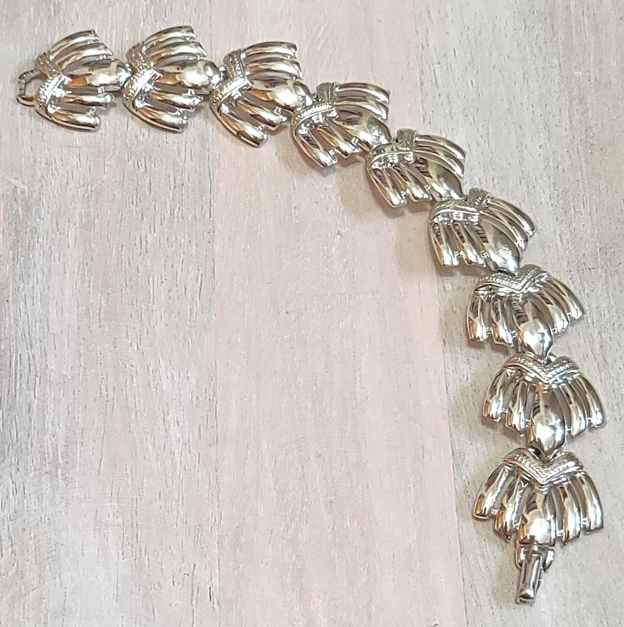 Vintage shell link bracelet, signed designer CORO, high polished silver