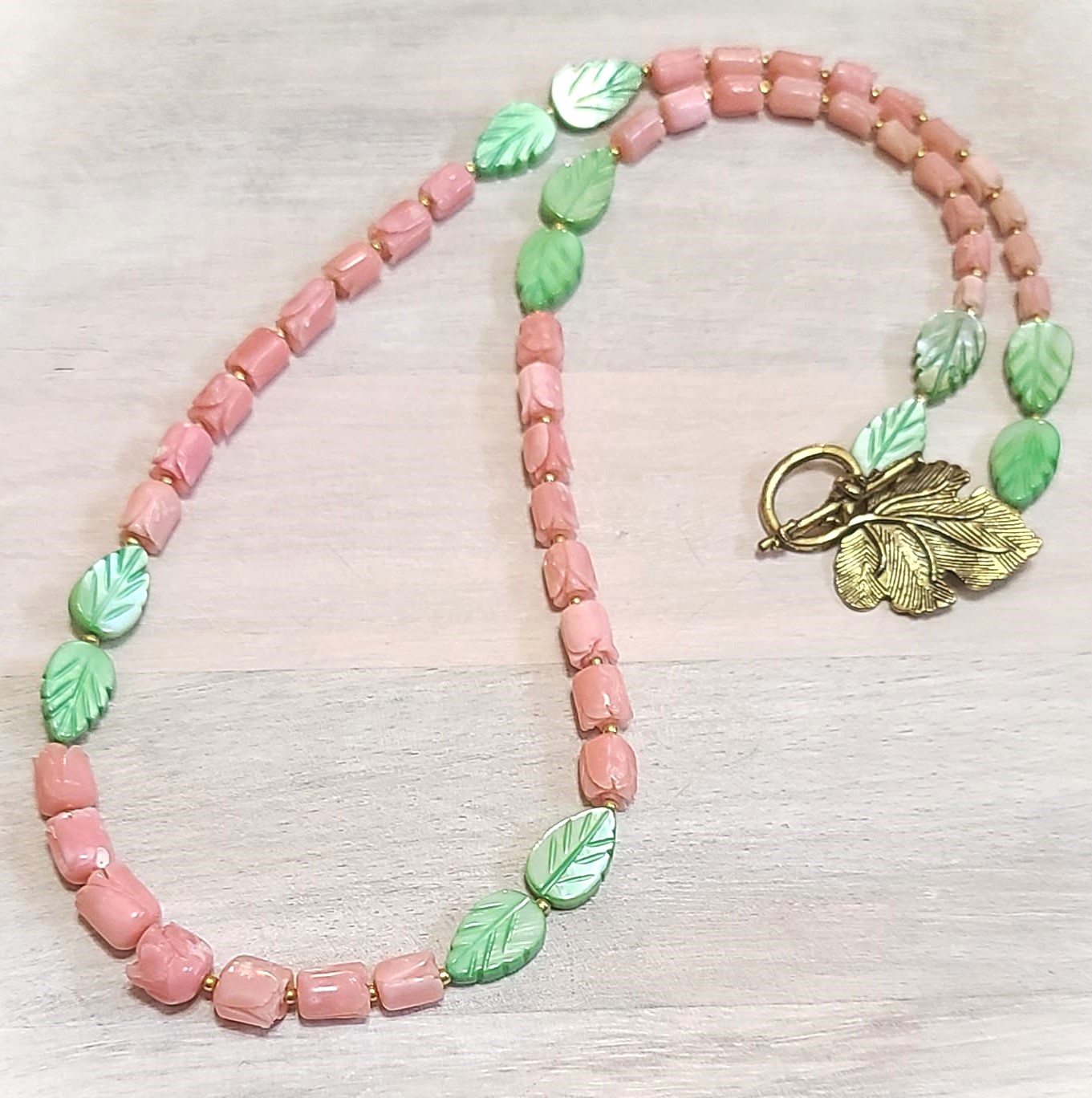 Carved coral necklace, tulip shaped coral, dyed shell leaves