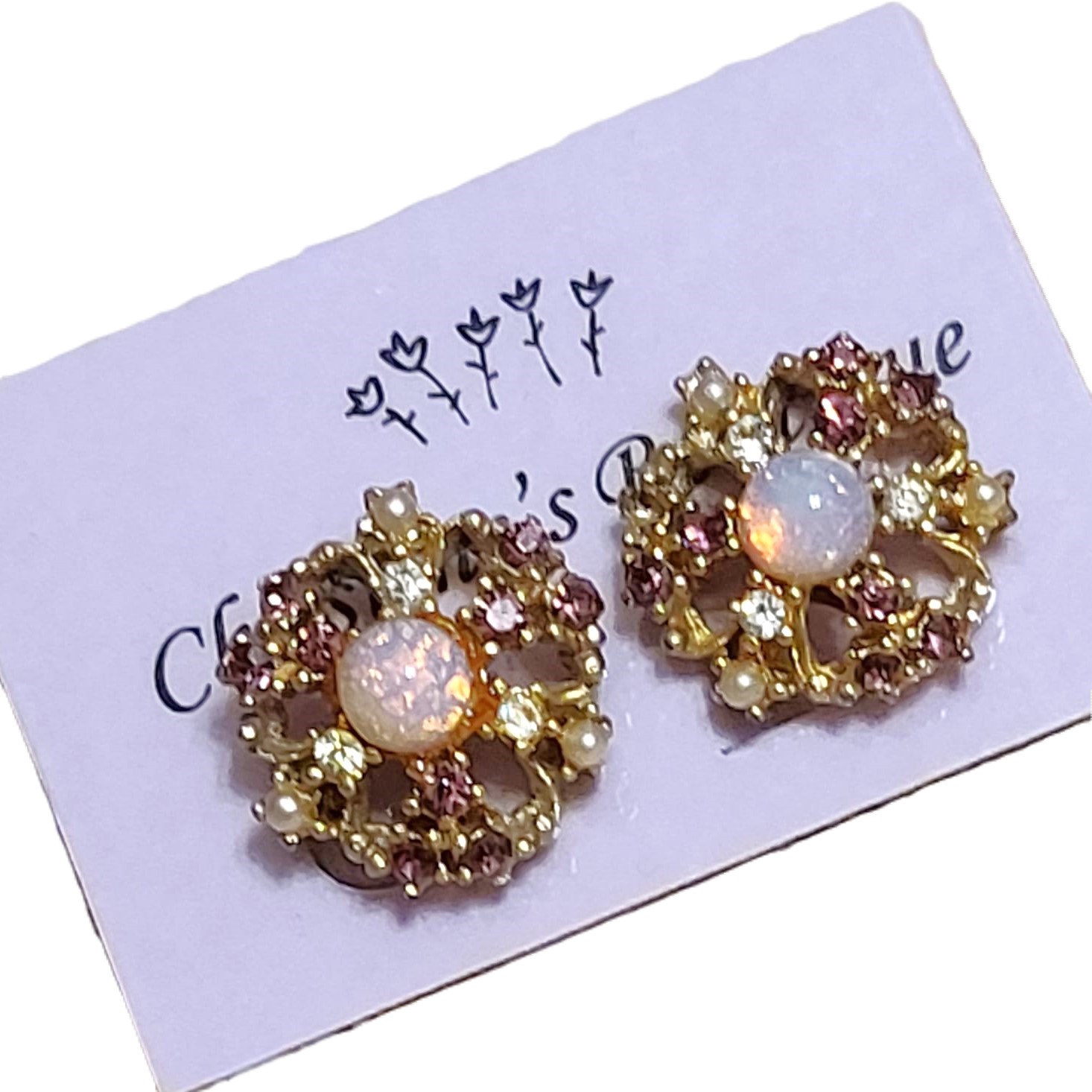 Purple rhinestone earrings with center pink foil cabachon, vintage screw back earrings