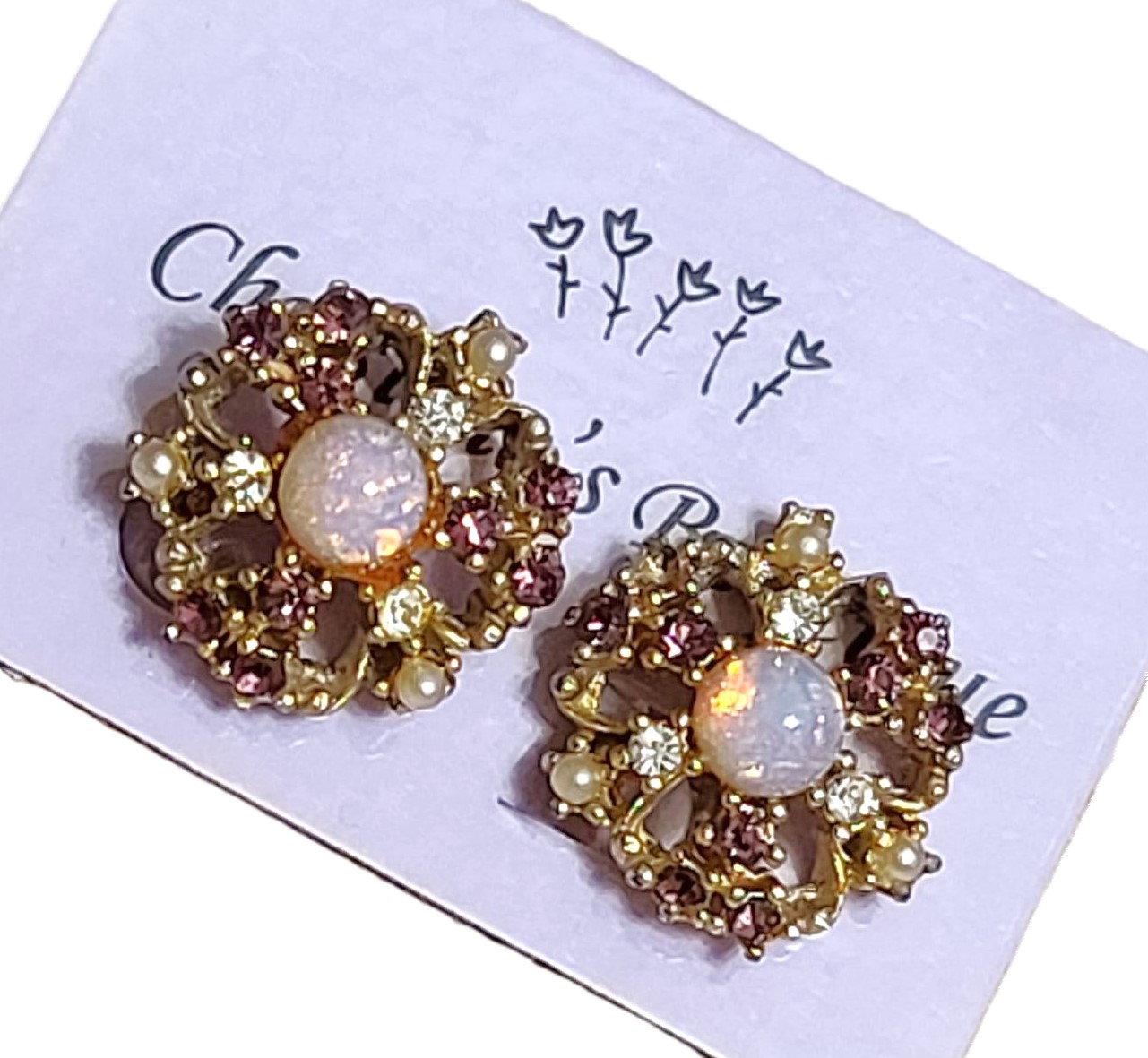 Purple rhinestone earrings with center pink foil cabachon, vintage screw back earrings