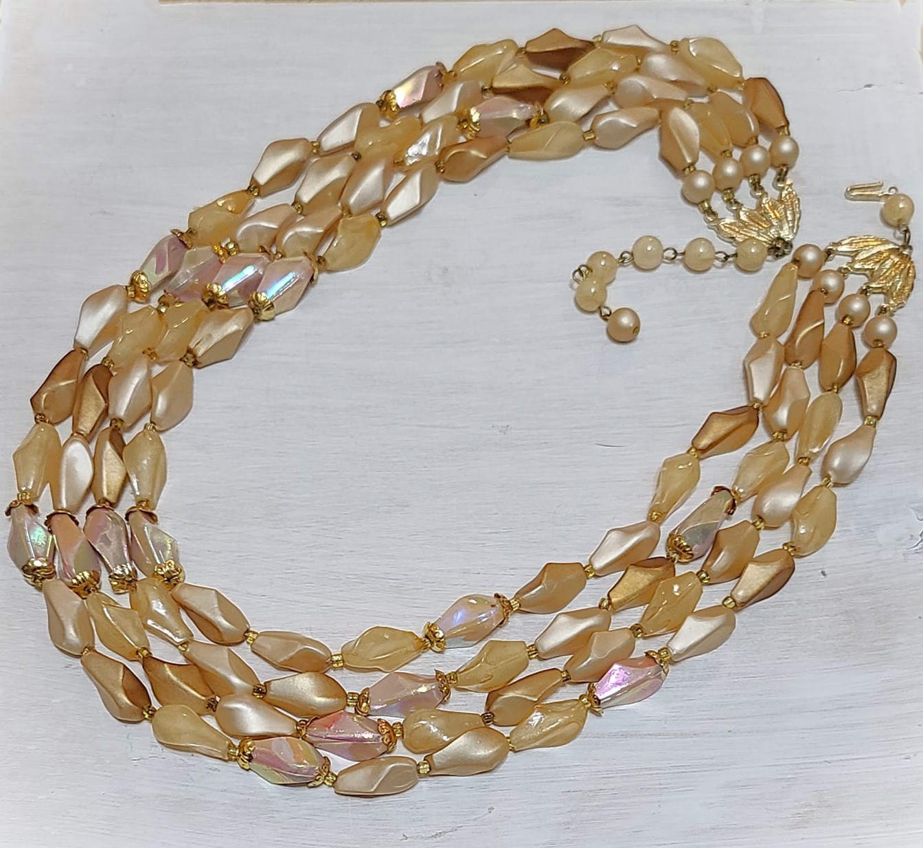 Irridscent carmel color 4 strand beaded necklace signed HongKong
