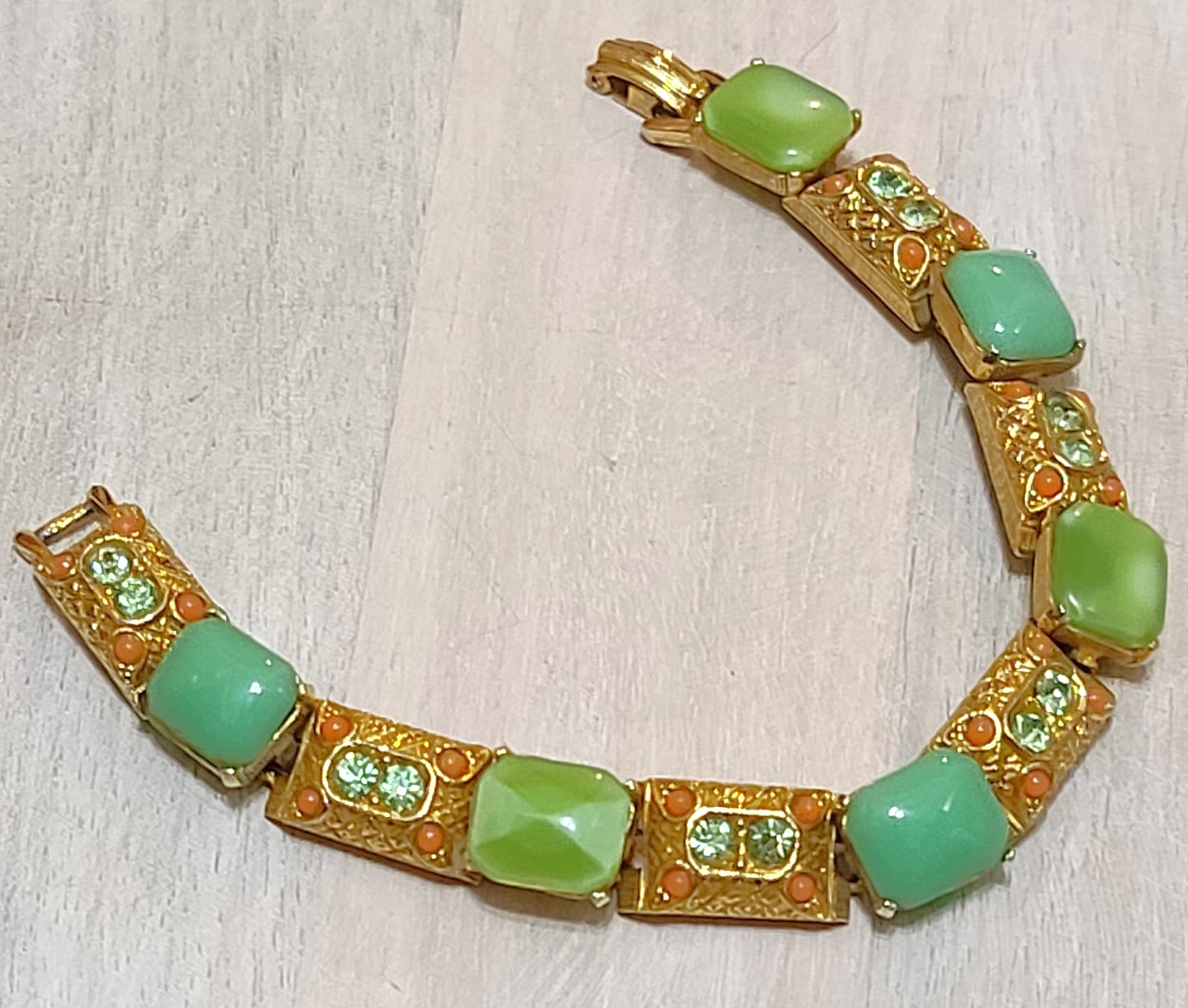 Green cabachon bracelet, vintage with orange cabachons, rhinestones, signed designerr ART