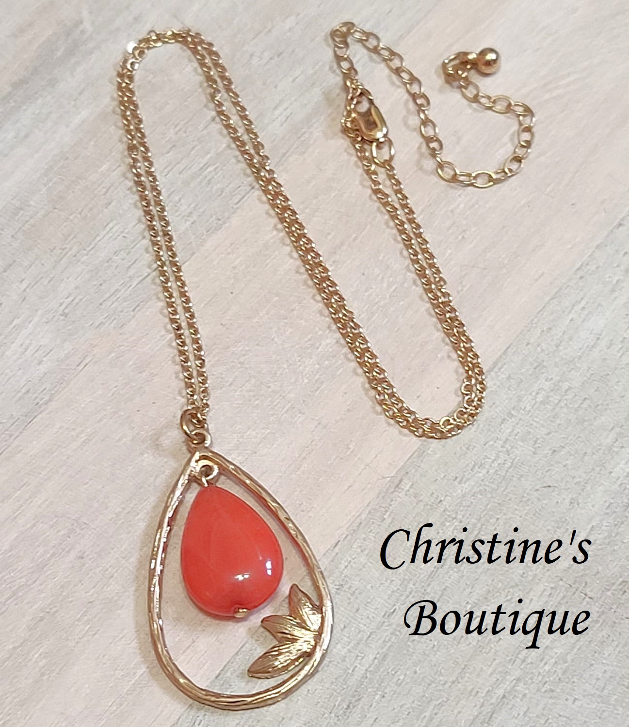 Gemstone pendant necklace, coral orange dyed quartz, with leaf pattern on chain - Click Image to Close