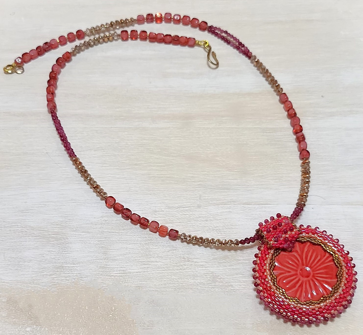 Gemstone necklace, cherry quartz with center ceramic medalion