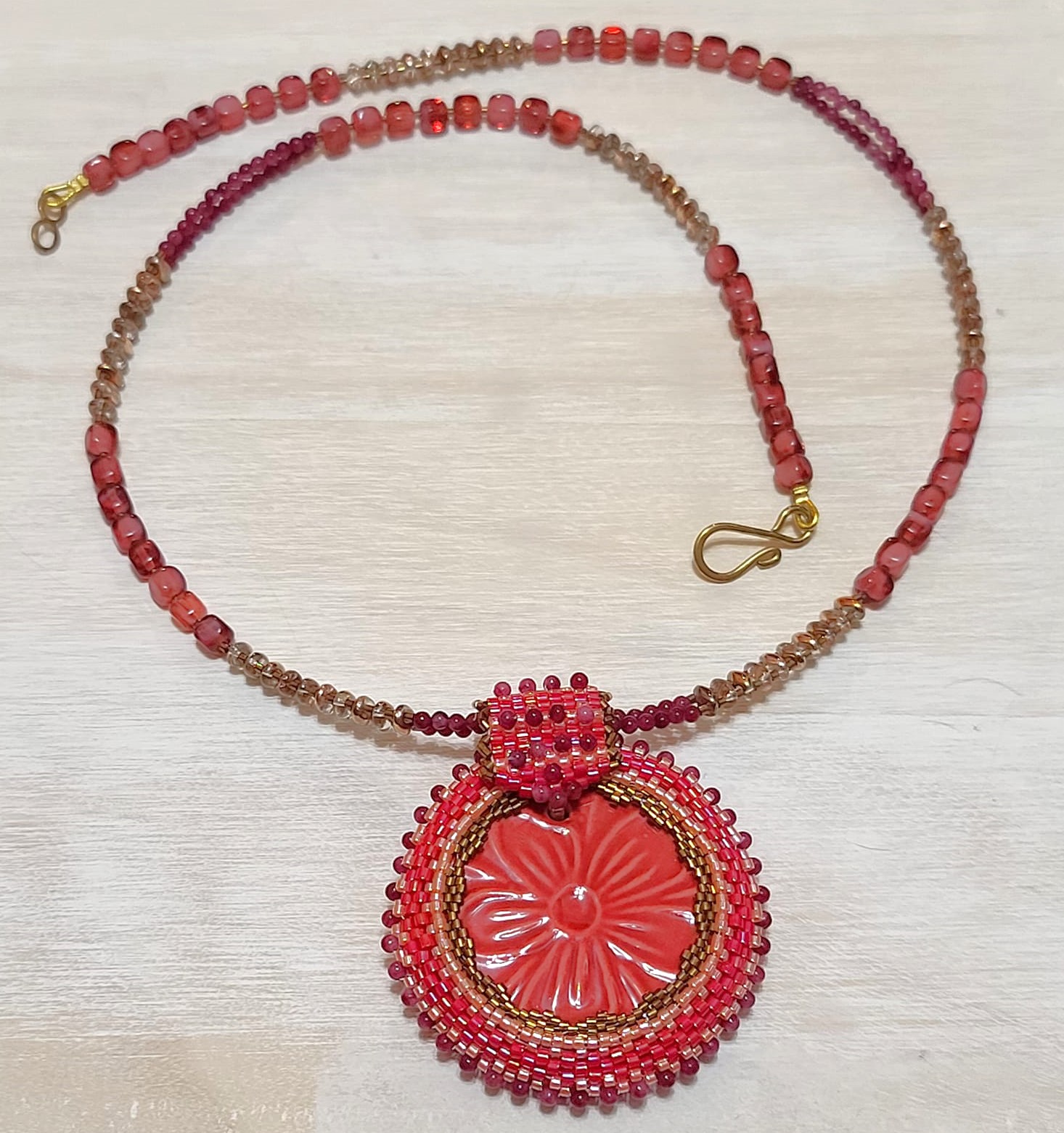 Gemstone necklace, cherry quartz with center ceramic medalion