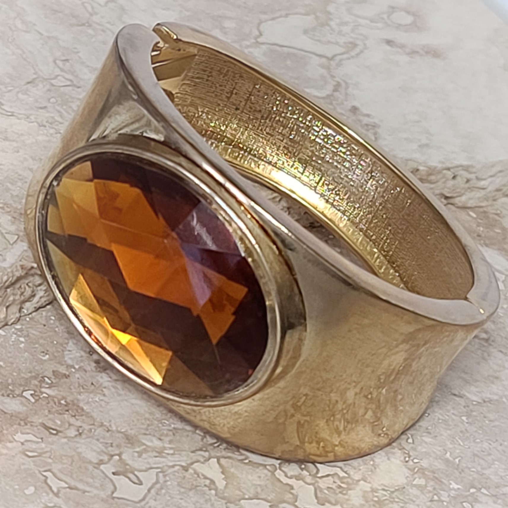 Fashion center amber rhinestone goldtone bracelet