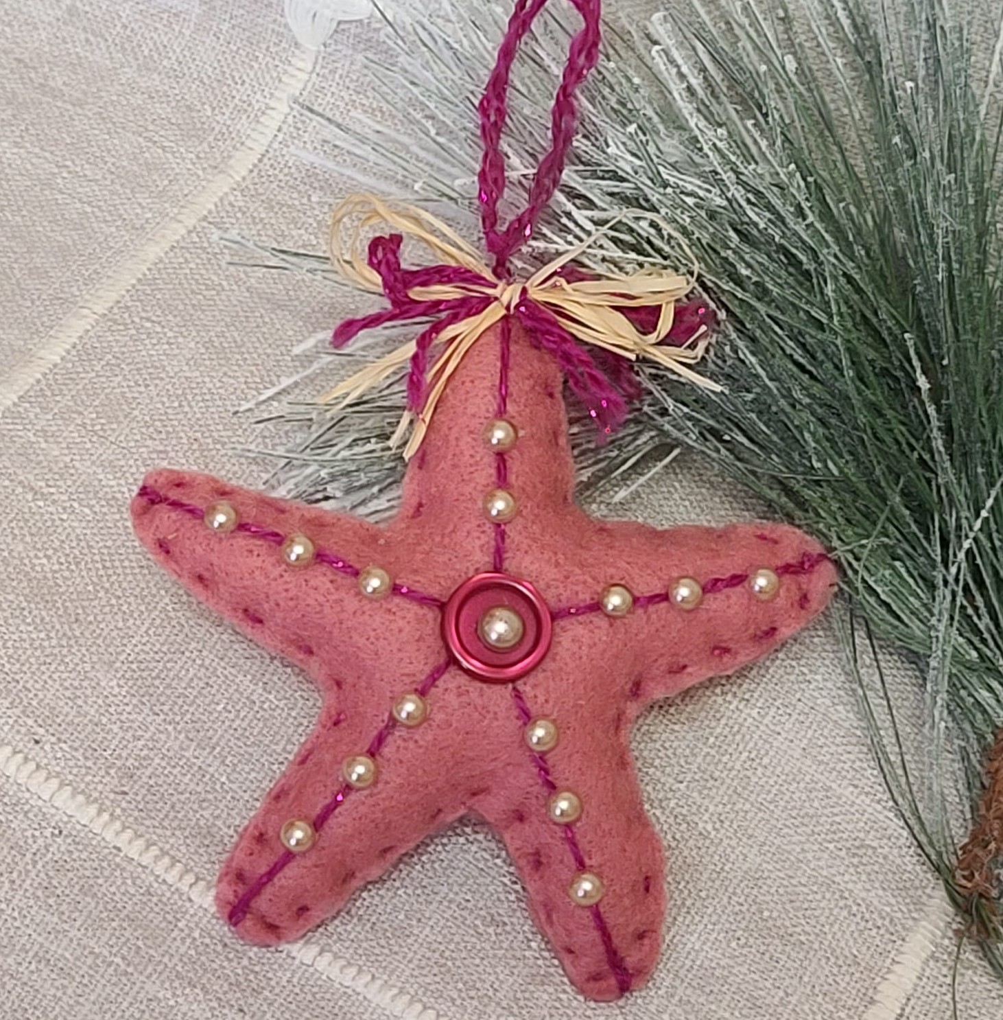 Starfish felt Christmas ornament - mauve pink with pink button