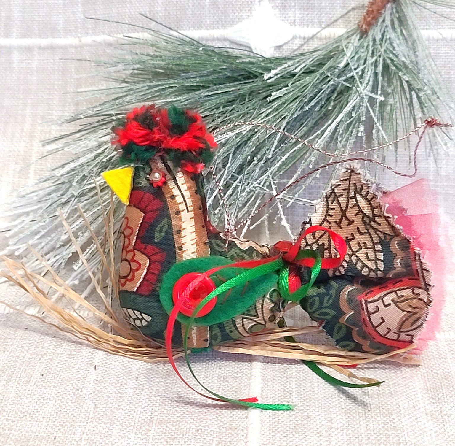 Whimsical bird on straw branch ornament -christmas colors