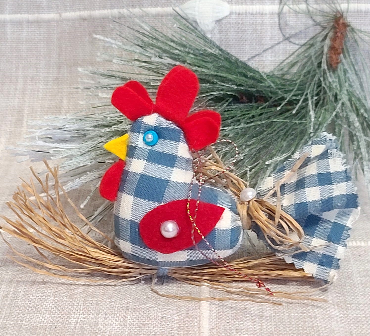 Country gingham rooster ornament on straw branch -blue and red