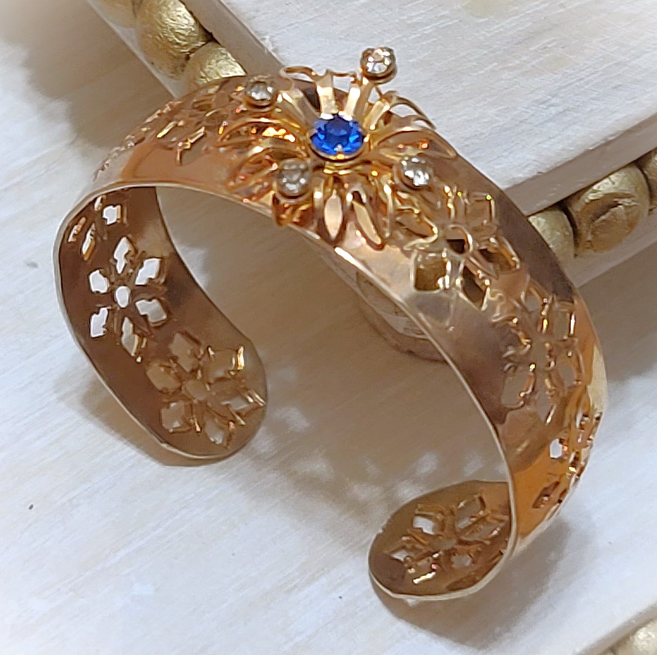 Copper cuff bracelet with cutout design with blue and white rhinestones, vintage bracelet
