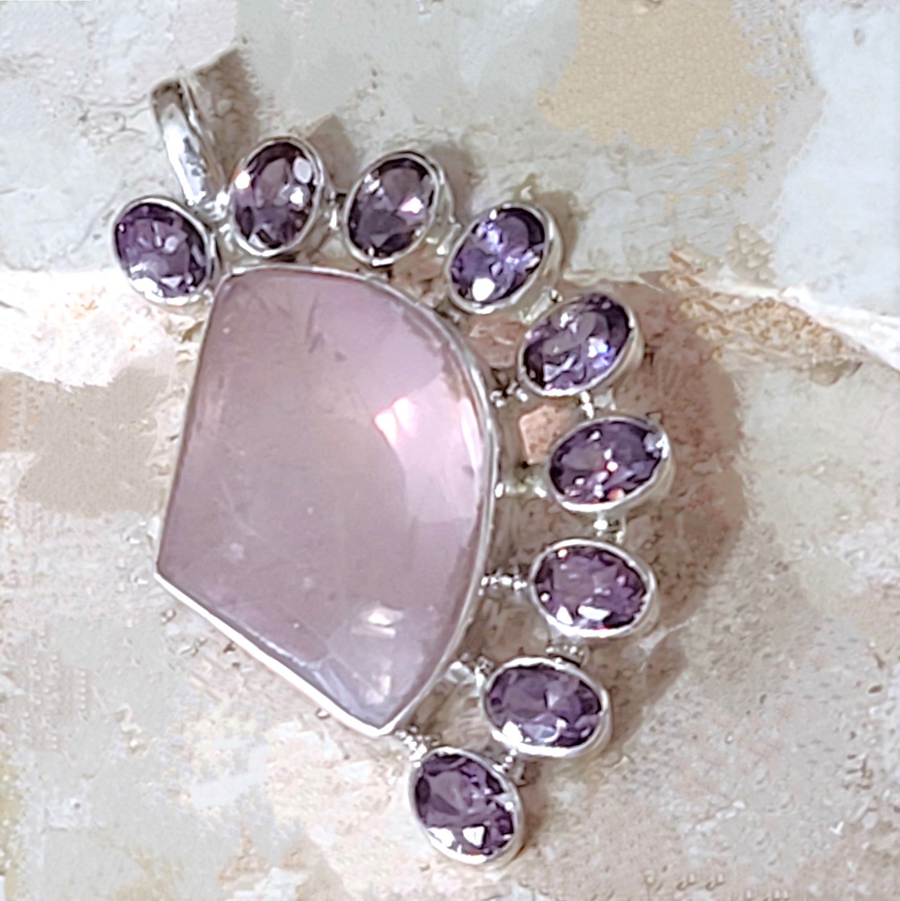 Rose quartz pendant with amethyst surrounding gemstones, moon shaped pendant set in 925 sterling silver