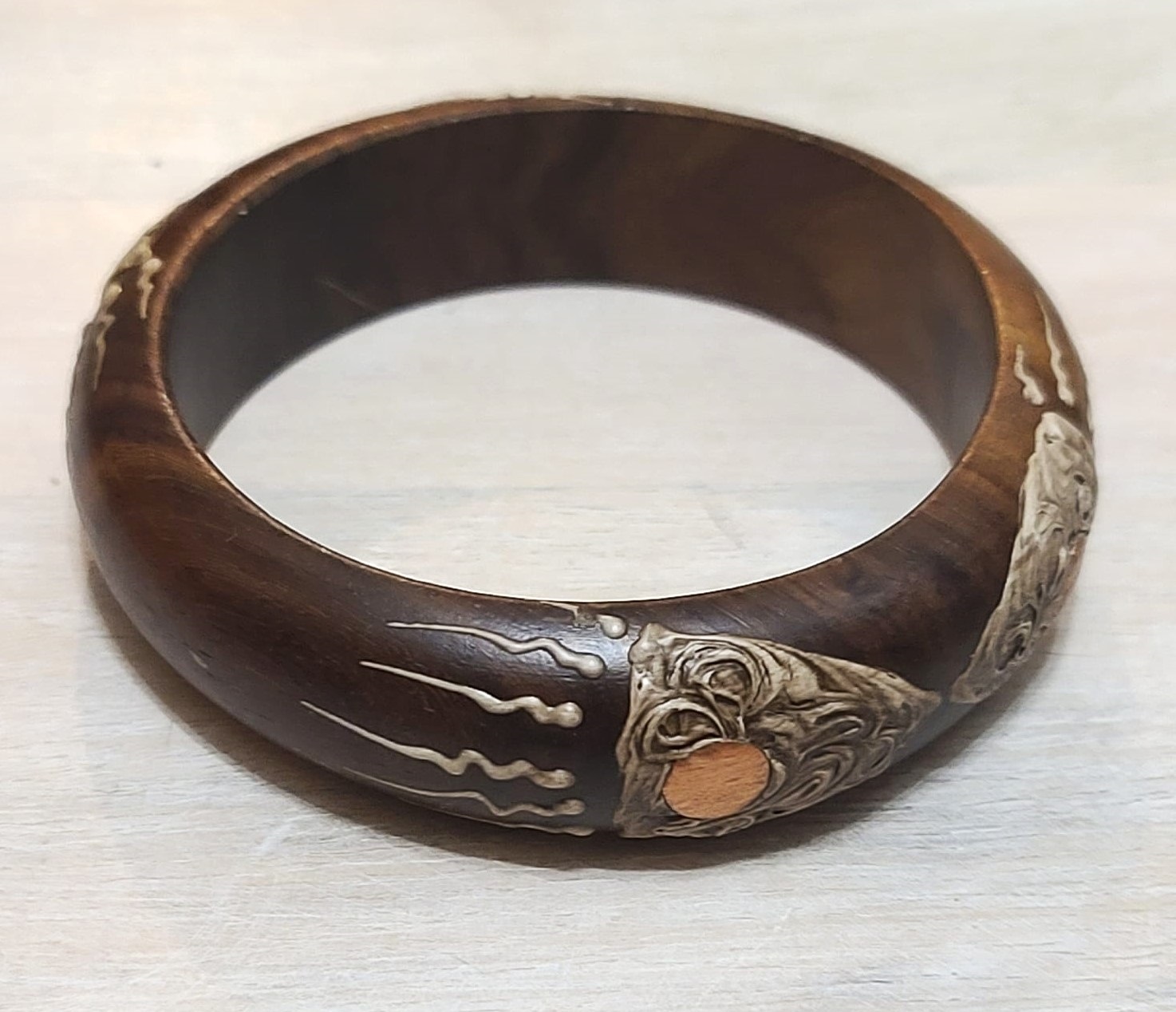 Wood bangle bracelet with copper accents