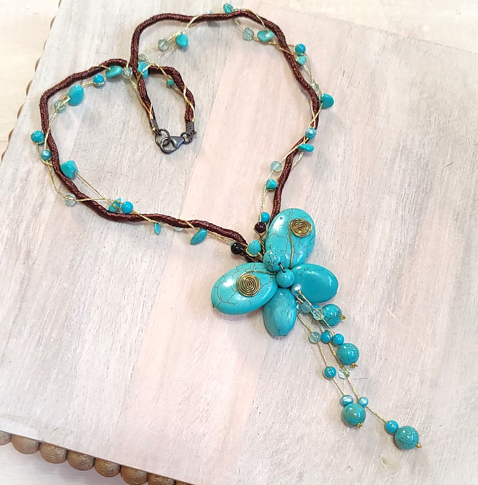 Turquoise howlite butterfly lariat on silk cording
