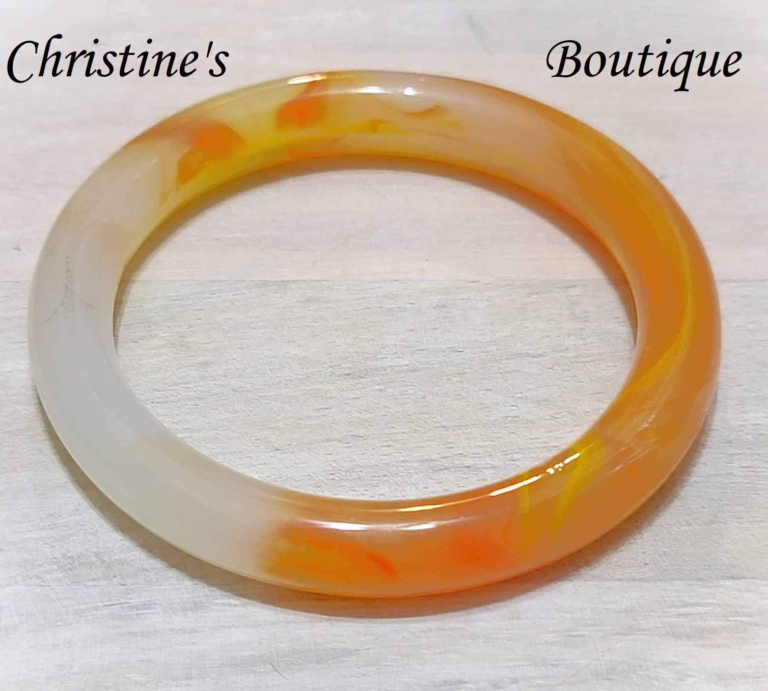 Glass bangle bracelet, vintage with iridescent orange and white swirls