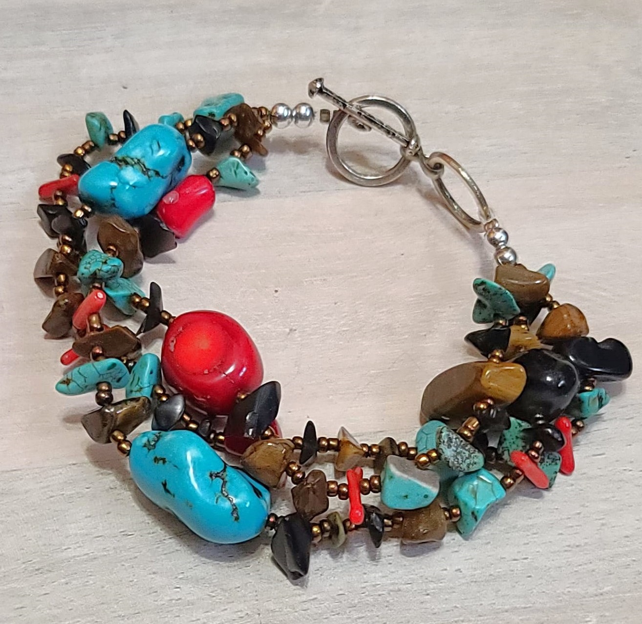 Gemstone nugget bracelet with 3 rows, dyed coral, turquoise, howlite, tiger eye