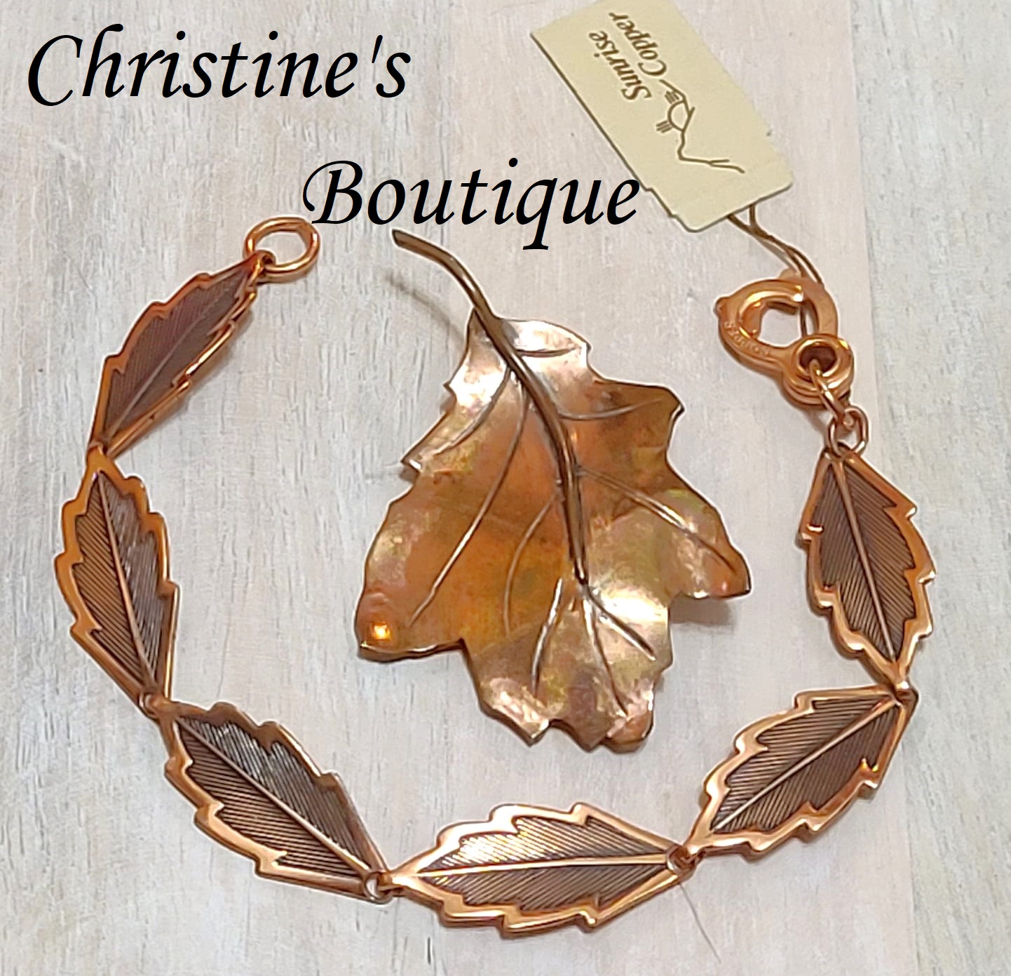 Copper leaf bracelet with matching copper maple leaf pin, vintage set, original tag