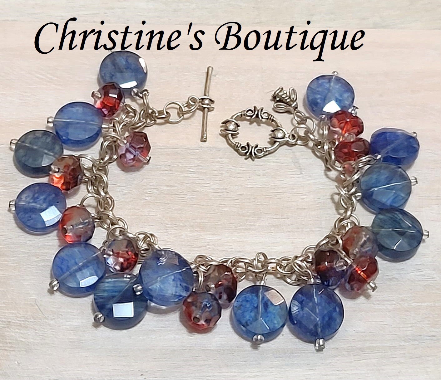 Charm bracelet, handcrafted, blue and red glass faceted beads, charms with bee silver charm - Click Image to Close