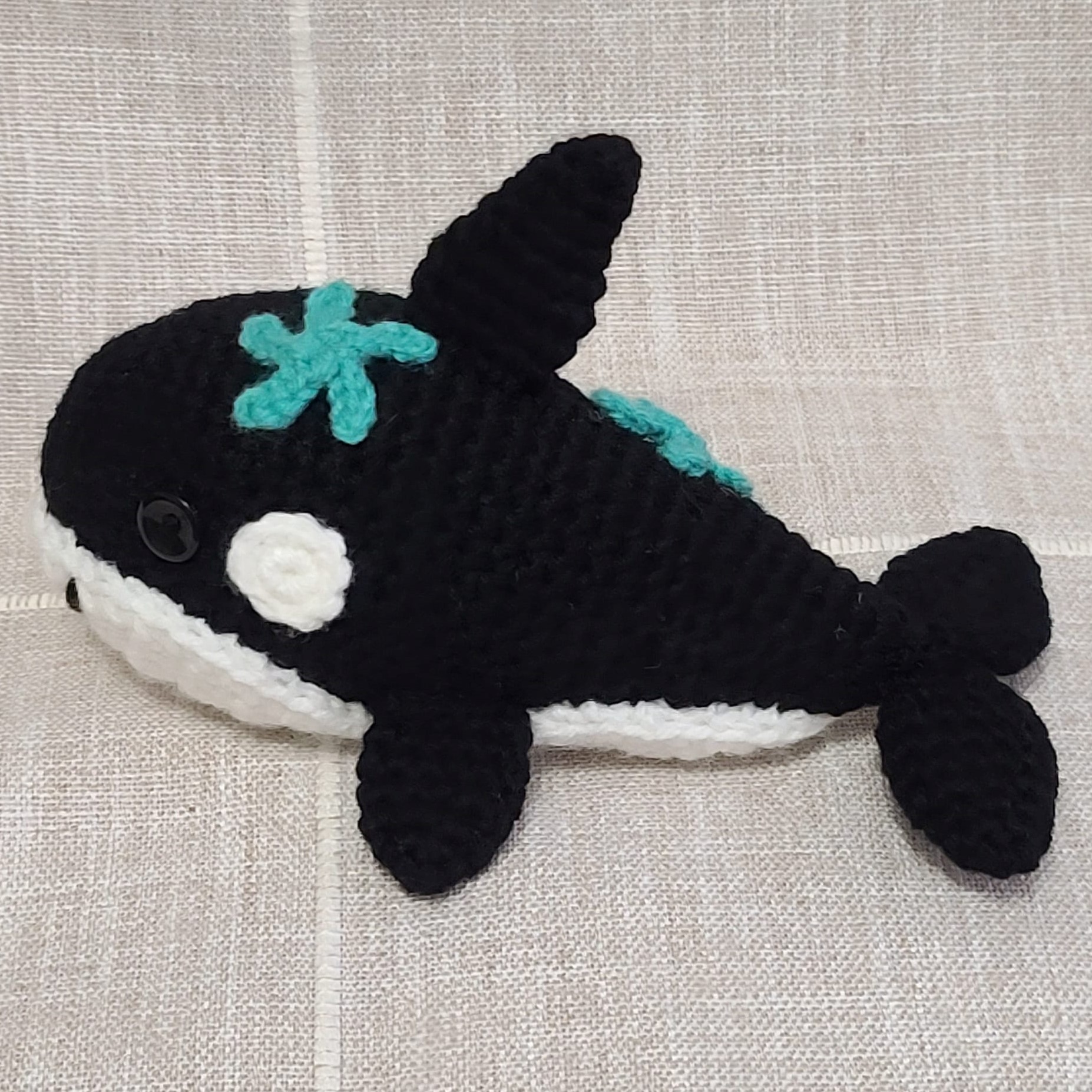 Crochet amigurumi handmade stuffed orca with starfish