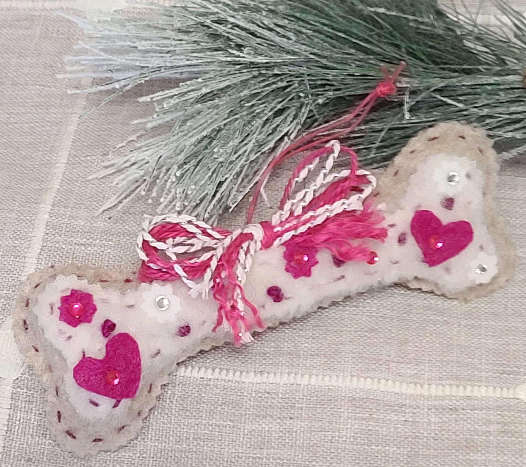 Dog bone ornament gingerbread felt with white fur and pink accen