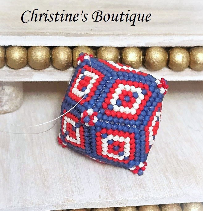 Handcrafted beaded ornament, beaded sphere shape, patriotic colors, red, white and blue