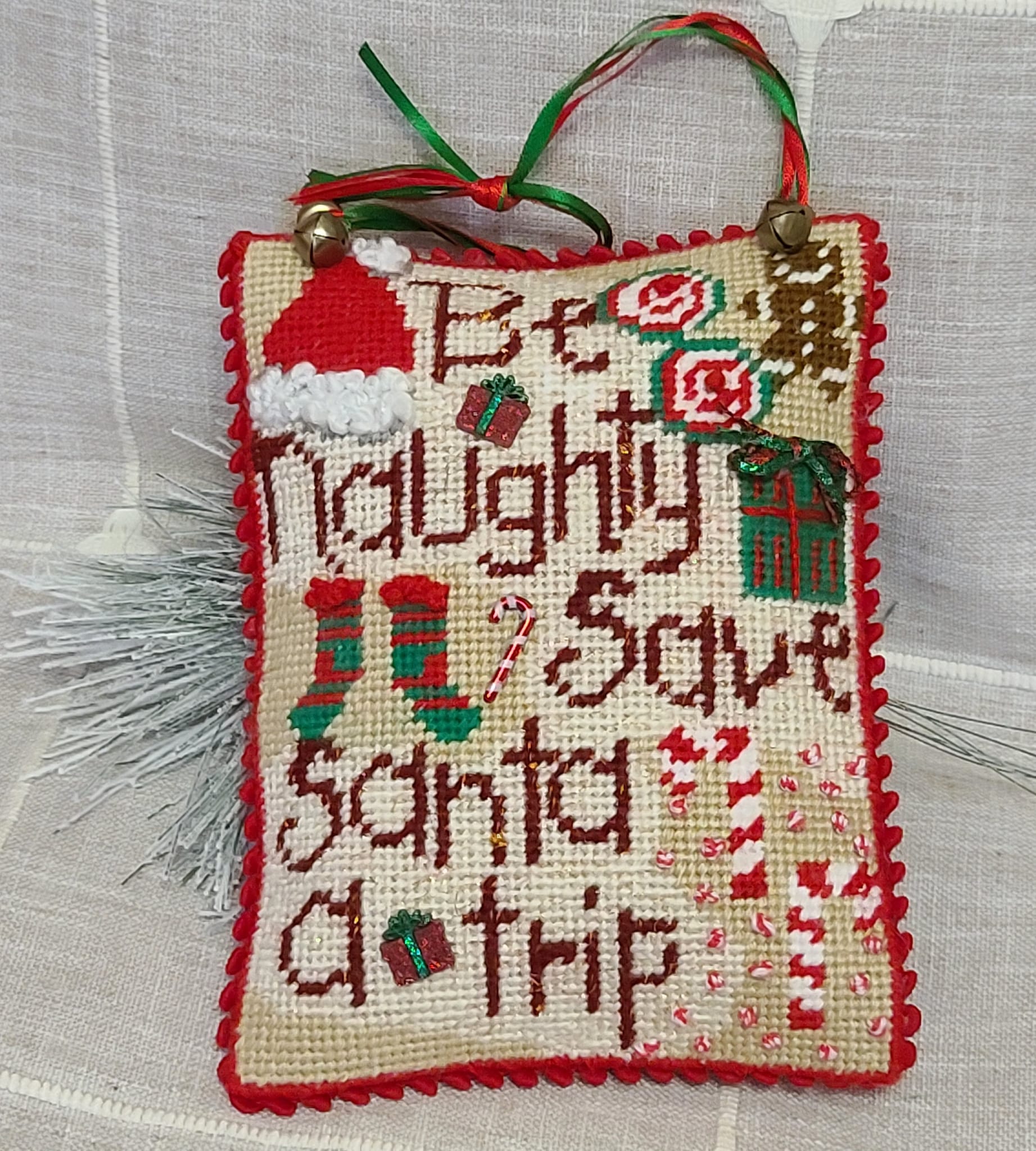 Needlepoint Save Santa a trip with embellisments, door hanger