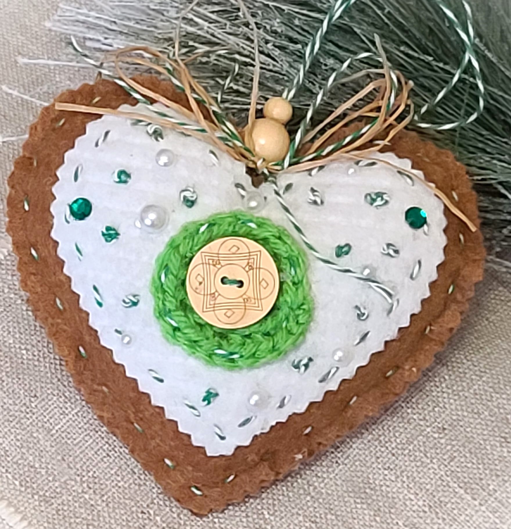 Gingerbread and icing felt with green accents celtic heart ornam
