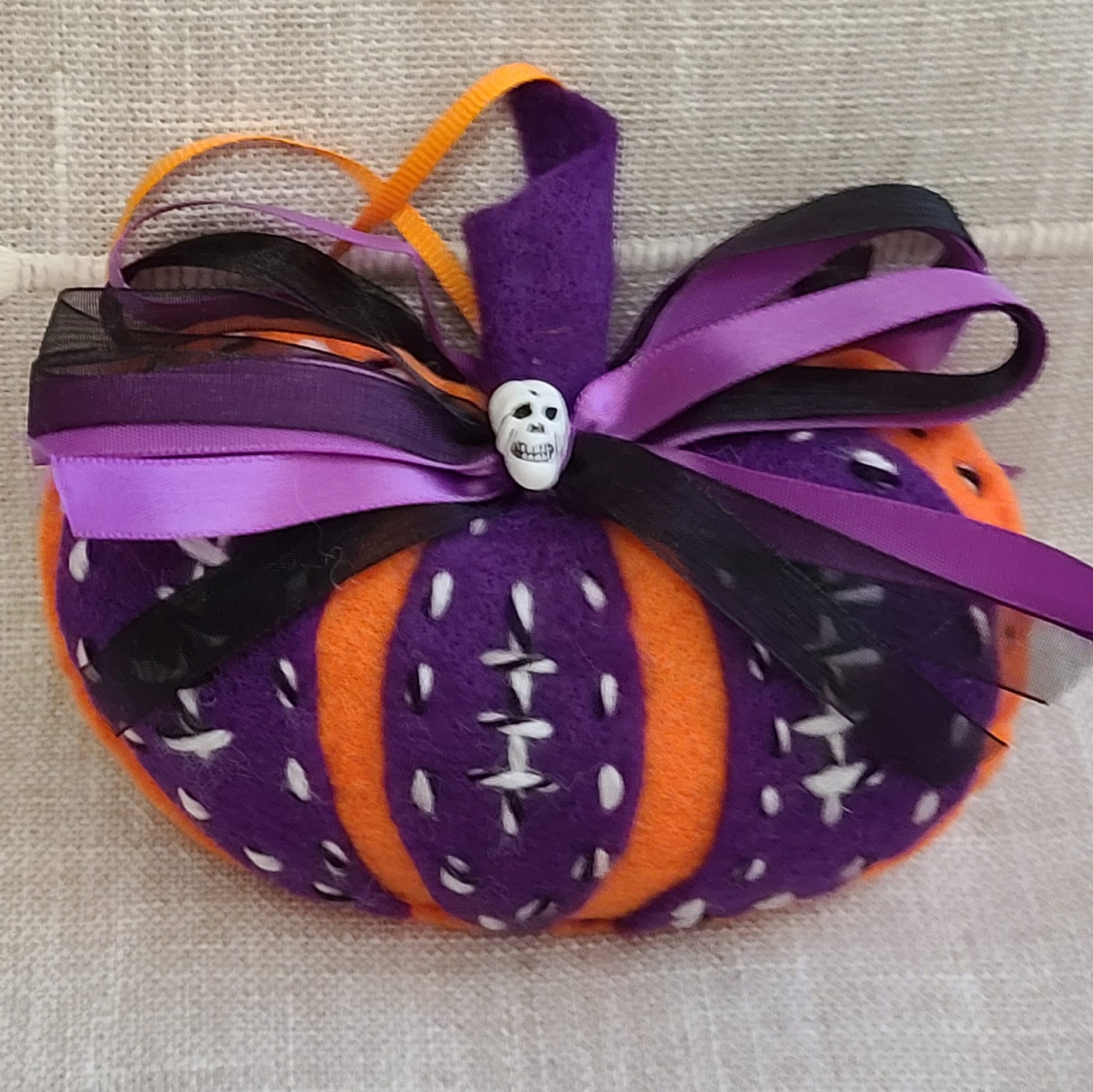 Felt pumpkin ornament - with skull button