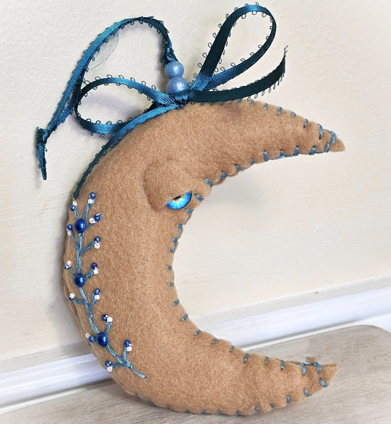 Moon ornament, beige moon with turquoise embroidery, whimsical, handcrafted moon, felt, embroidery, bead accents