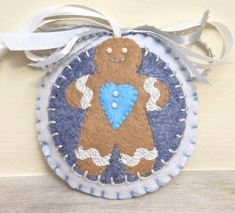 Felt ornament, handmade, gingerbread man with glass bead accents