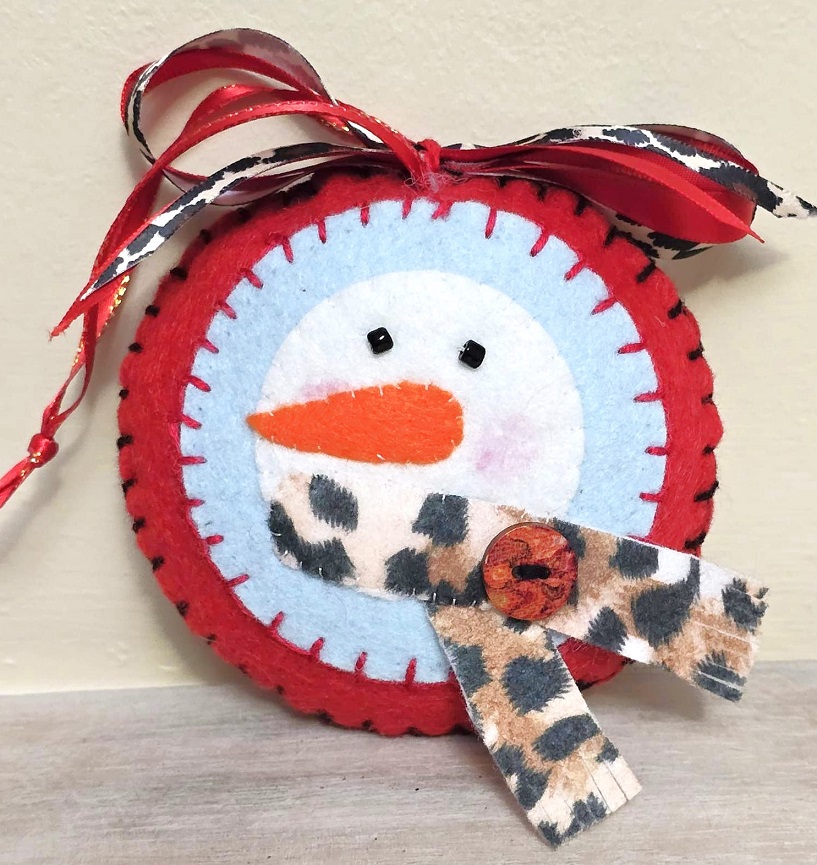 Felt ornament, handmade snowman face with scarf - animal print