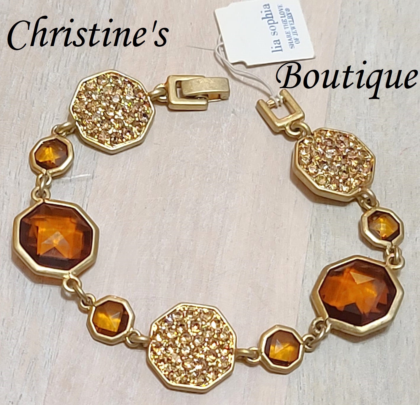Topaz rhinestone bracelet, pave rhinestones, link style with designer tags - Click Image to Close