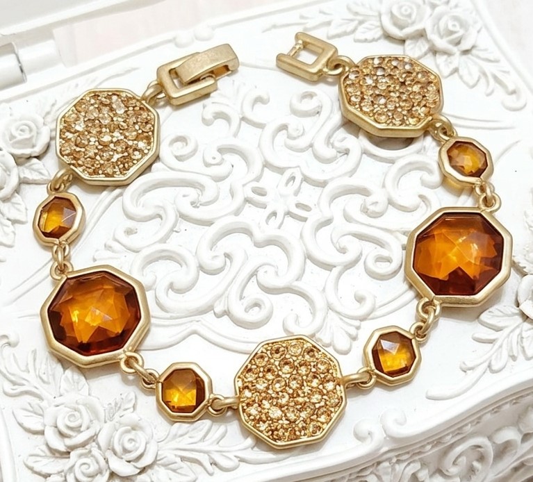 Topaz rhinestone bracelet, pave rhinestones, link style with designer tags