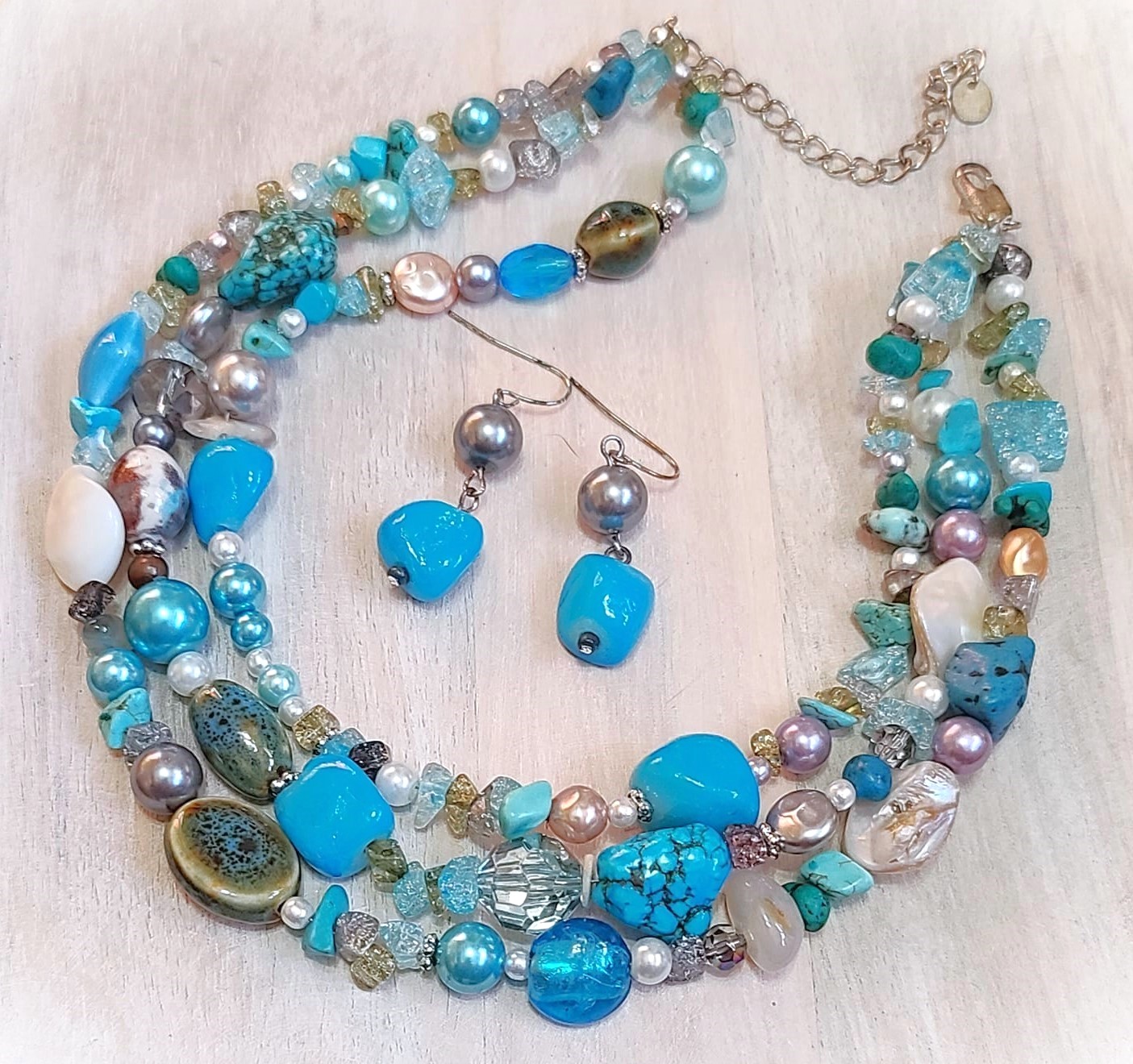 Turquoise howlite, glass, ceramic 3 strand necklace and earrings