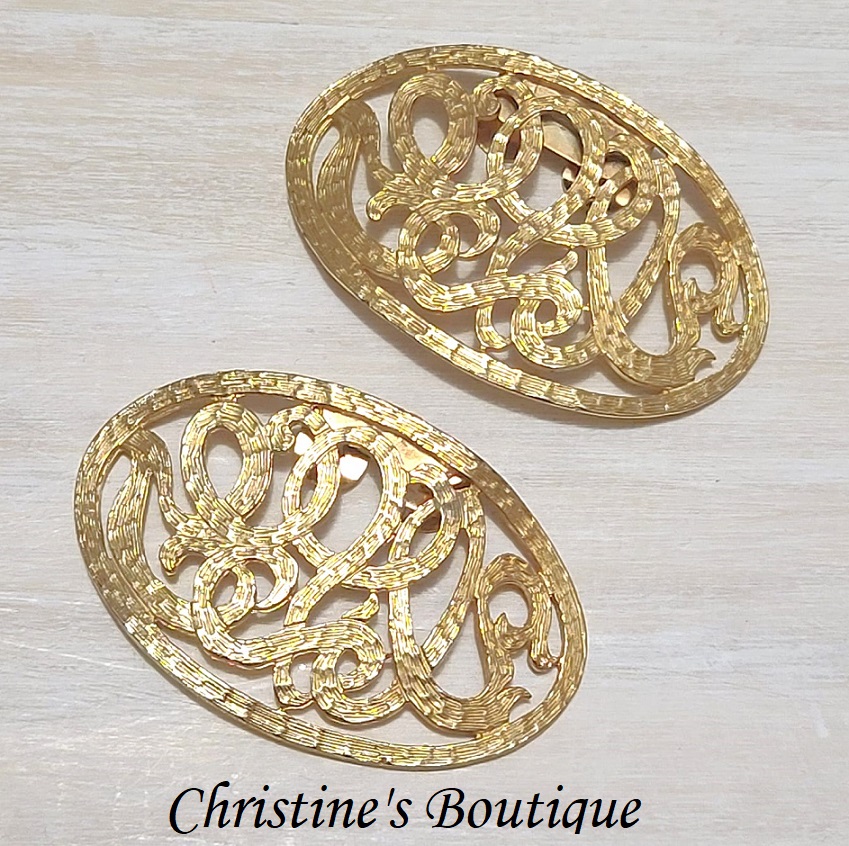 Goldtone shoe clips, scrolled oval shaped, vintage shoe clips