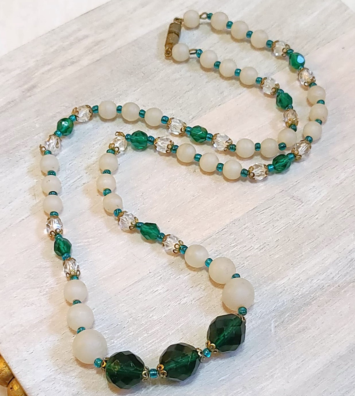 Green crystal and bead necklace, green and white crystals, lucite beads with twist clasp