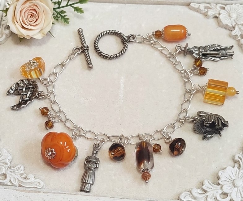 Thanksgiving charm bracelet, pewter turkey, apple pie, pilgrams and alternating glass beads