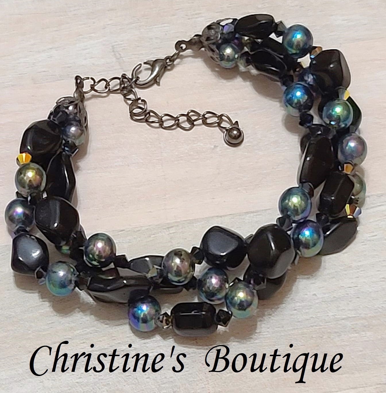 Beaded bracelet, 3 strand, carnival beads and black glass beads