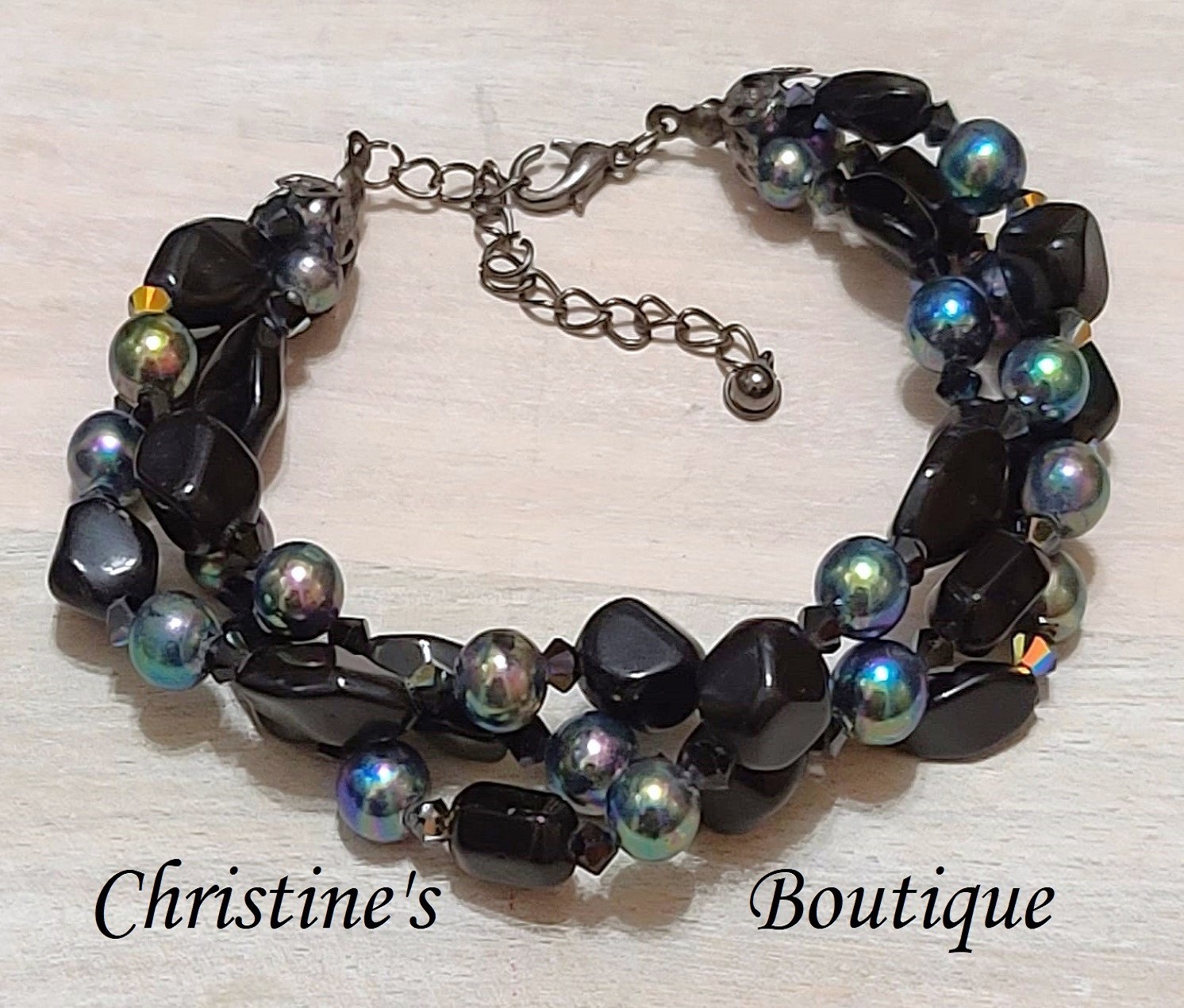 Beaded bracelet, 3 strand, carnival beads and black glass beads