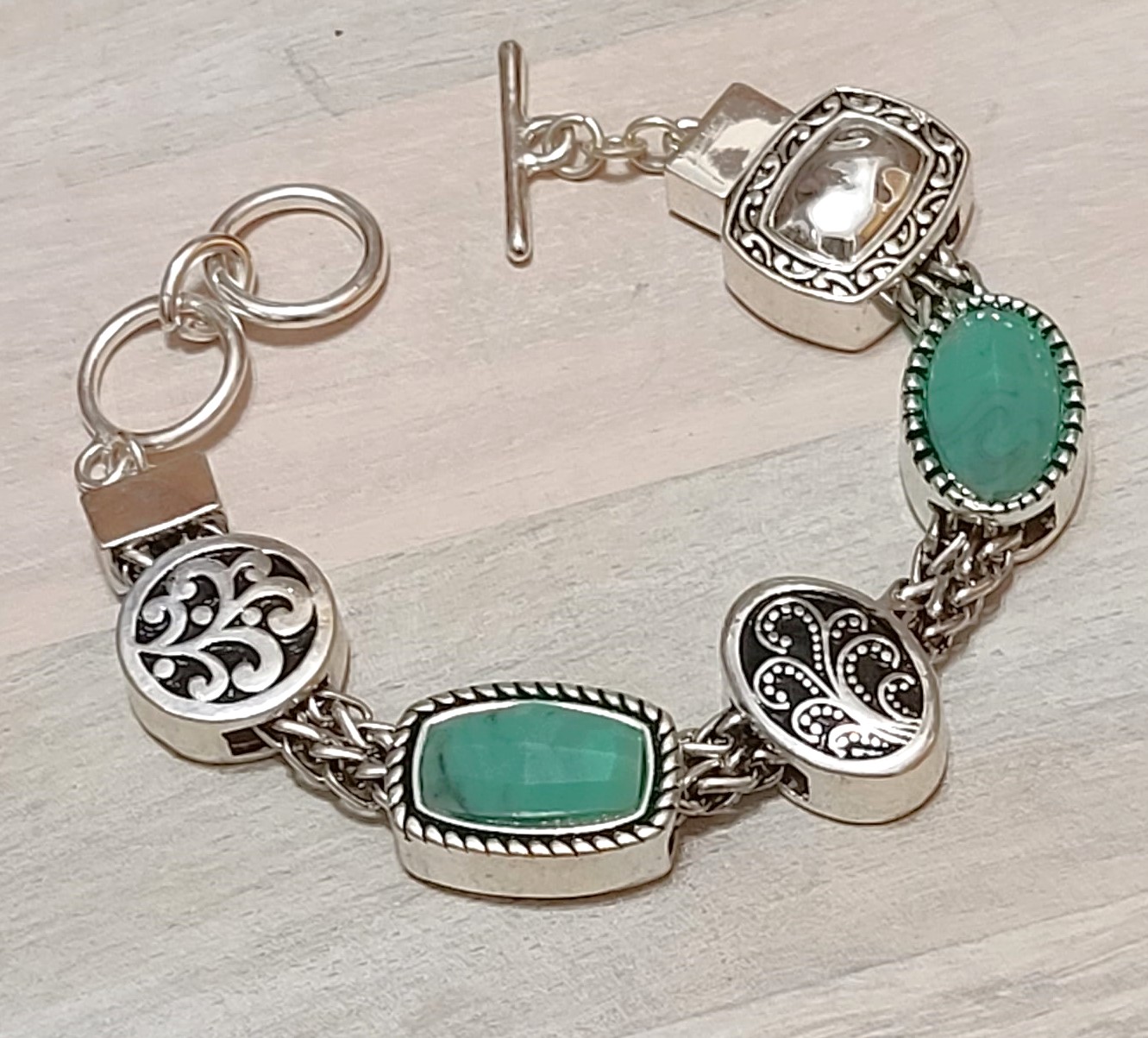 Slide charm bracelet, fashion turquoise cabachons in silver tone, costume
