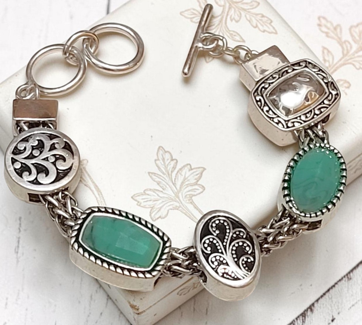 Slide charm bracelet, fashion turquoise cabachons in silver tone, costume