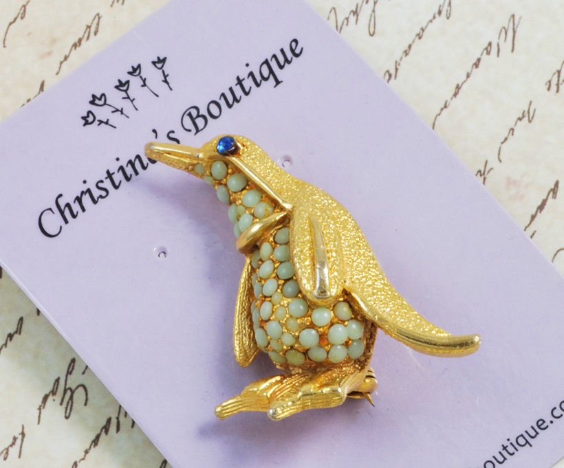 Penguin Pin Surrounded in Light Blue Stones