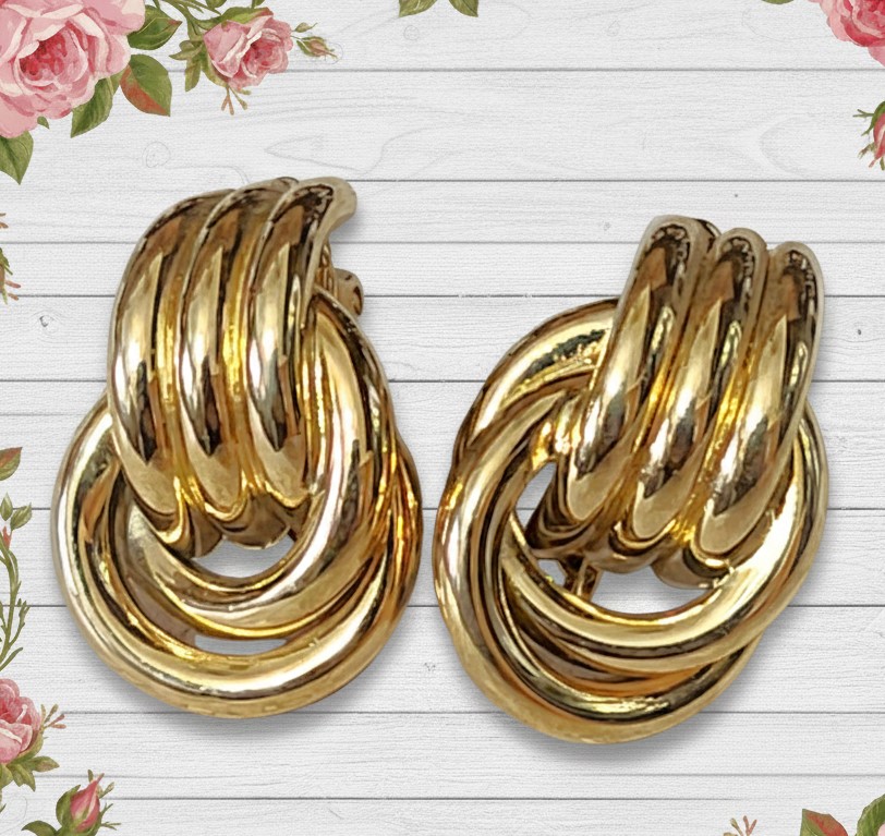 Goldtone earrings, twisted knot, vintage clip on earrings by designer Trifari